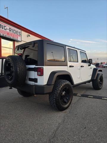 used 2014 Jeep Wrangler Unlimited car, priced at $21,991