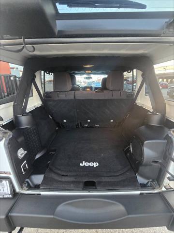 used 2014 Jeep Wrangler Unlimited car, priced at $21,991