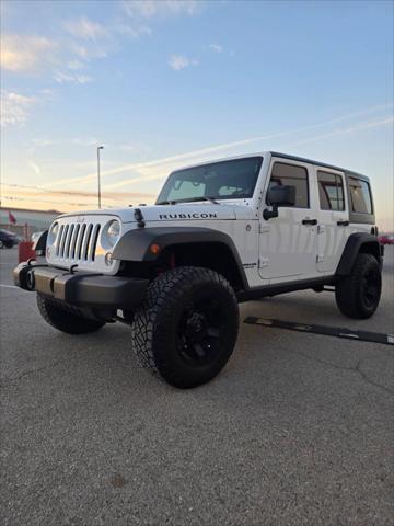 used 2014 Jeep Wrangler Unlimited car, priced at $21,991