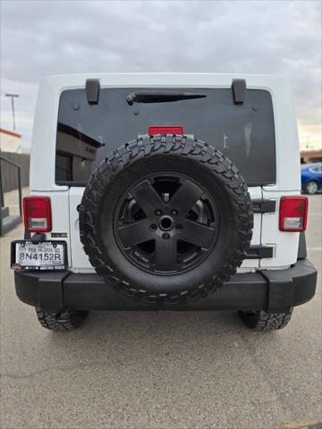 used 2013 Jeep Wrangler car, priced at $18,491