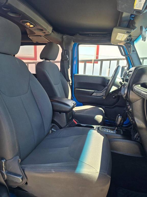 used 2015 Jeep Wrangler car, priced at $15,491