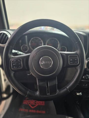 used 2015 Jeep Wrangler Unlimited car, priced at $22,491