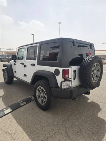 used 2015 Jeep Wrangler Unlimited car, priced at $22,491