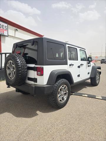 used 2015 Jeep Wrangler Unlimited car, priced at $22,491