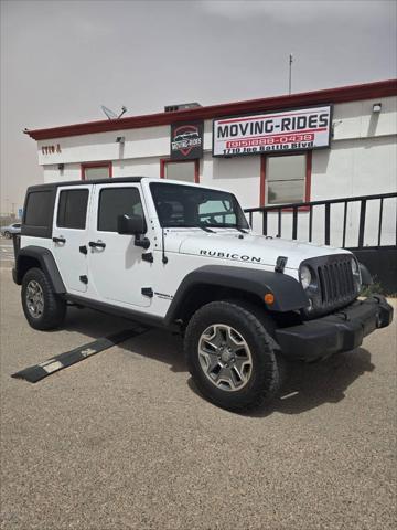 used 2015 Jeep Wrangler Unlimited car, priced at $22,491