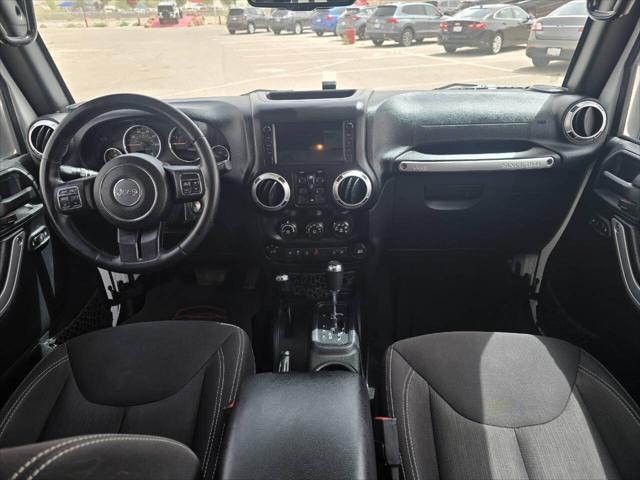 used 2015 Jeep Wrangler Unlimited car, priced at $22,491