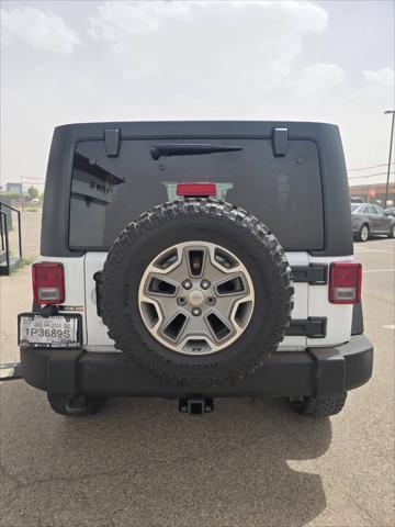 used 2015 Jeep Wrangler Unlimited car, priced at $22,491