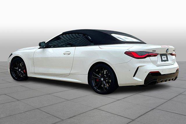 used 2023 BMW M4 car, priced at $62,100