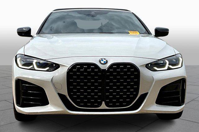 used 2023 BMW M4 car, priced at $62,100