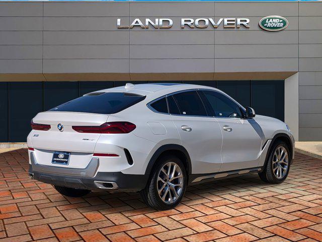 used 2023 BMW X6 car, priced at $49,686