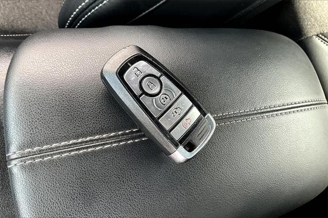 used 2024 Ford Mustang car, priced at $42,879