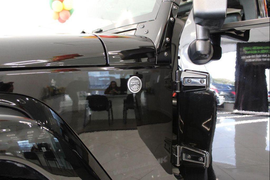 used 2018 Jeep Wrangler JK Unlimited car, priced at $21,095