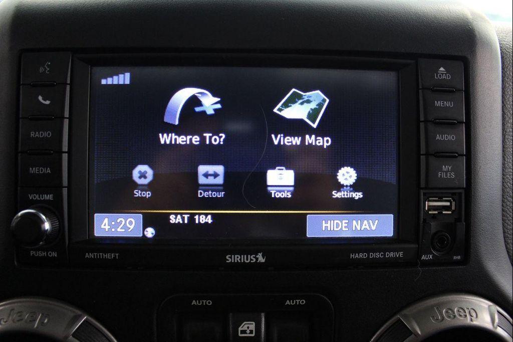 used 2018 Jeep Wrangler JK Unlimited car, priced at $21,095