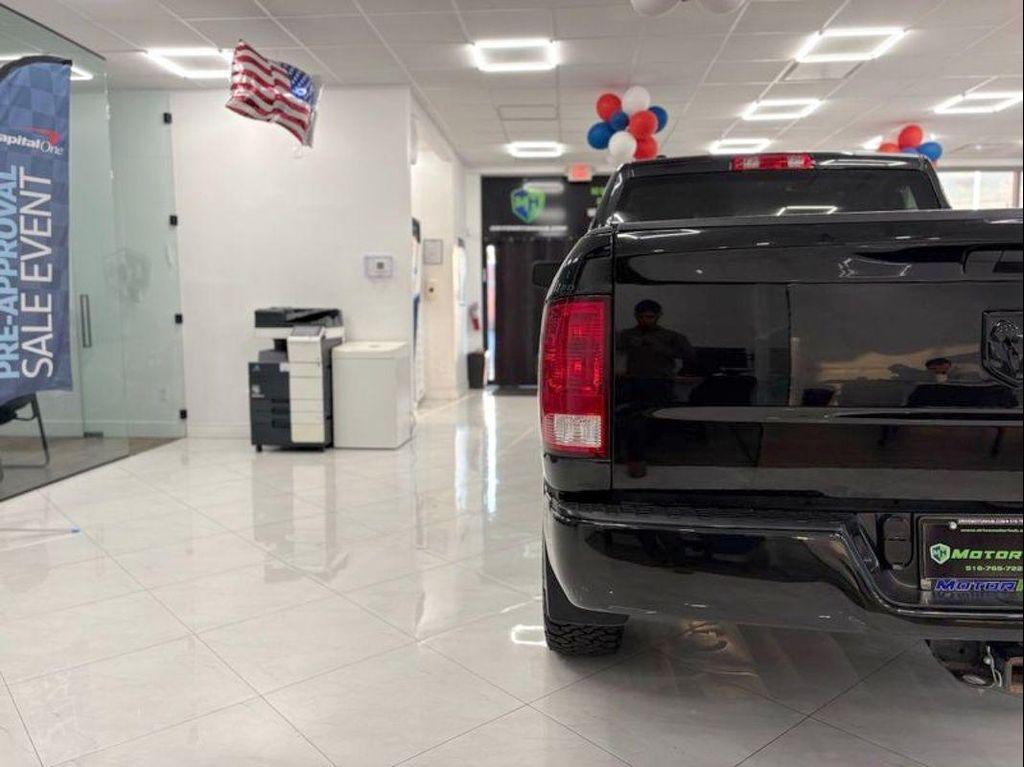used 2018 Ram 1500 car, priced at $19,195