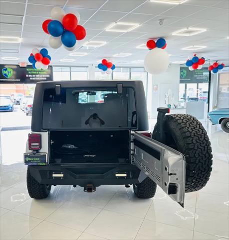 used 2015 Jeep Wrangler Unlimited car, priced at $20,995