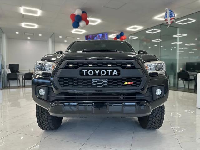 used 2018 Toyota Tacoma car, priced at $33,995