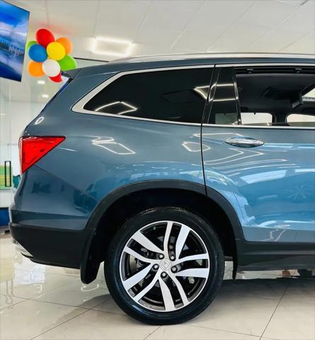 used 2018 Honda Pilot car, priced at $22,595