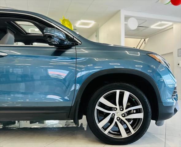 used 2018 Honda Pilot car, priced at $22,595