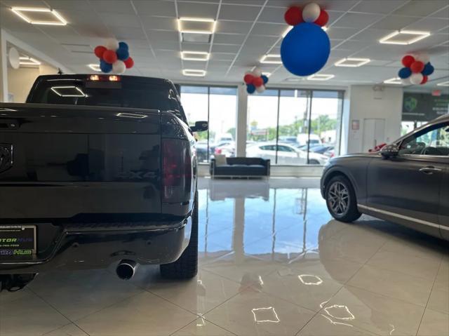 used 2018 Ram 1500 car, priced at $26,595
