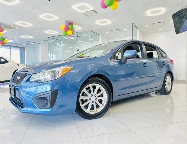 used 2014 Subaru Impreza car, priced at $6,695