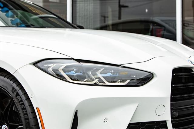 used 2022 BMW M4 car, priced at $69,900