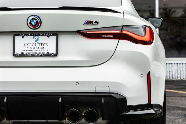 used 2022 BMW M4 car, priced at $69,900