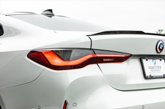 used 2022 BMW M4 car, priced at $69,900