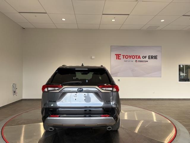 used 2021 Toyota RAV4 Hybrid car, priced at $29,990