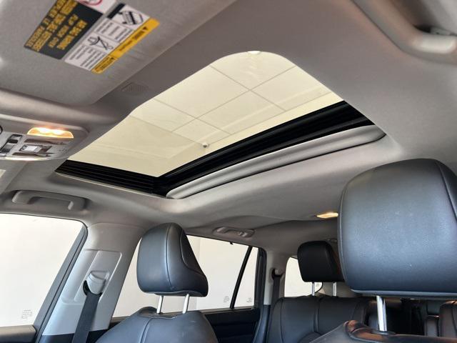 used 2021 Toyota Highlander Hybrid car, priced at $28,990