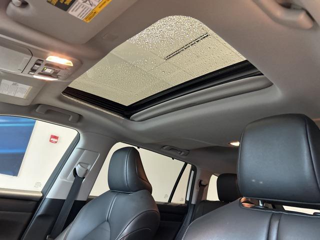 used 2021 Toyota Highlander Hybrid car, priced at $34,990