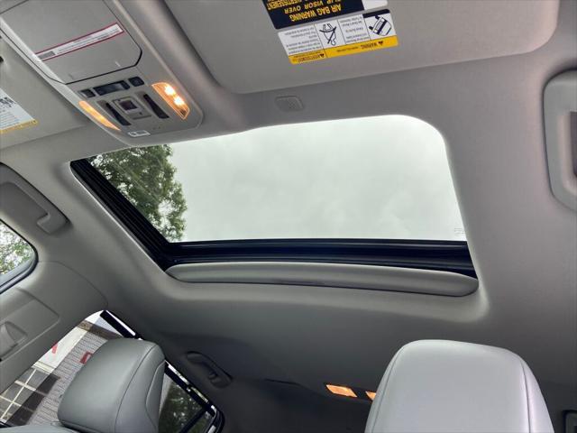 used 2021 Toyota Highlander Hybrid car, priced at $44,791