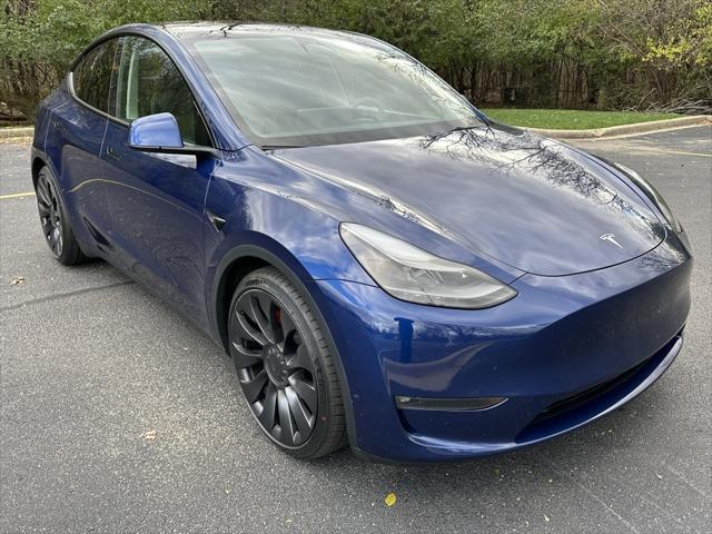 used 2023 Tesla Model Y car, priced at $34,695