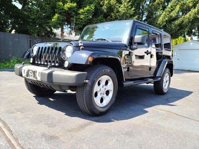 used 2015 Jeep Wrangler Unlimited car, priced at $20,490