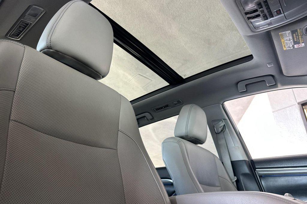 used 2019 Toyota Highlander Hybrid car, priced at $23,998