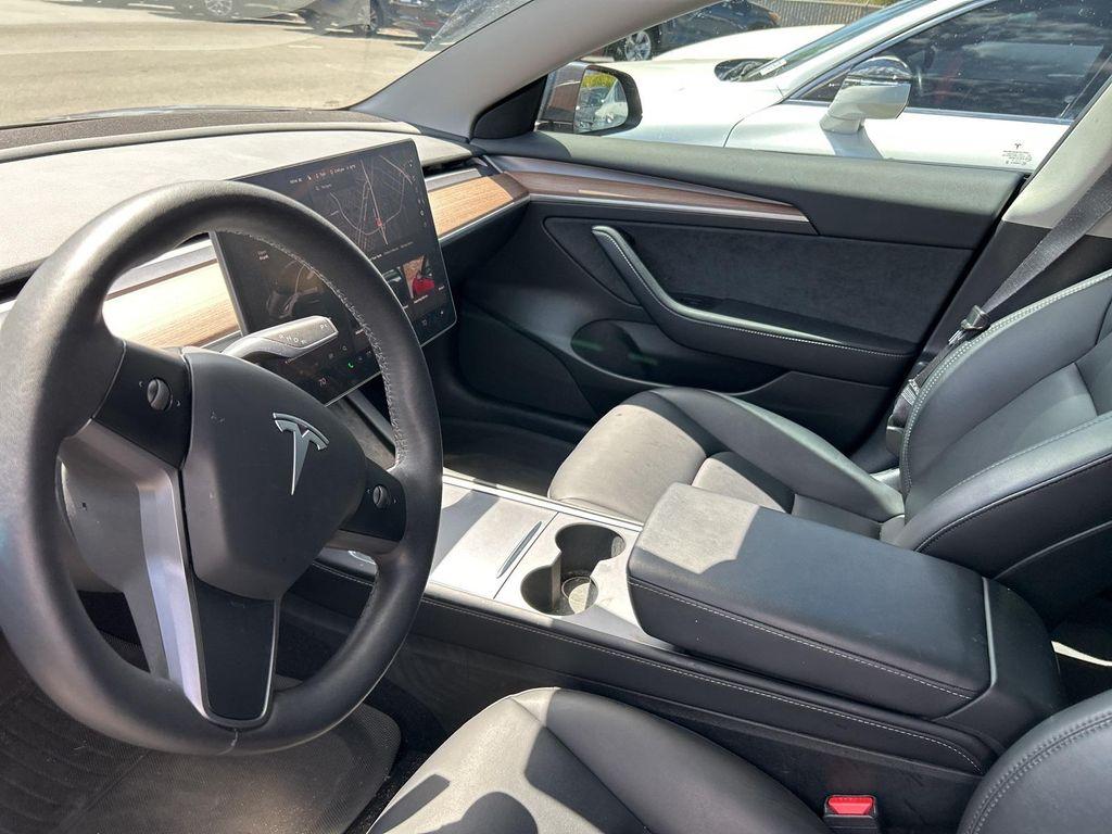 used 2023 Tesla Model 3 car, priced at $25,998
