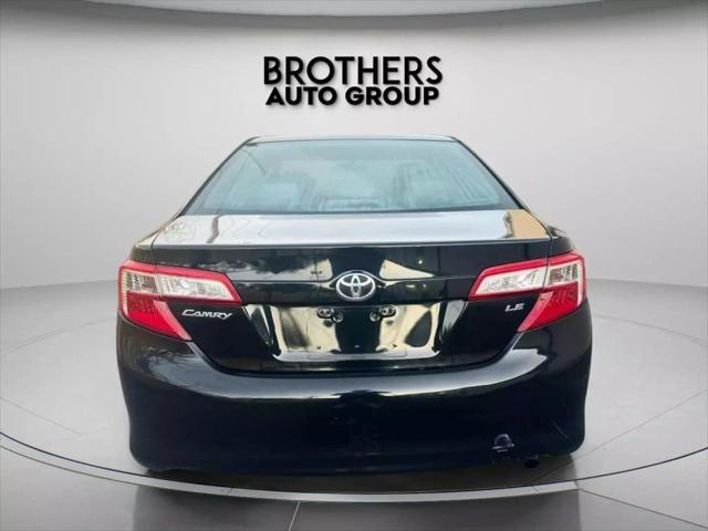 used 2012 Toyota Camry car, priced at $9,900
