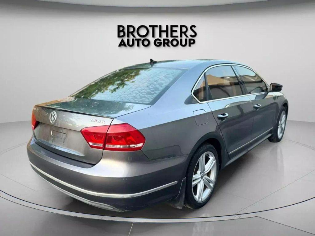 used 2014 Volkswagen Passat car, priced at $8,900