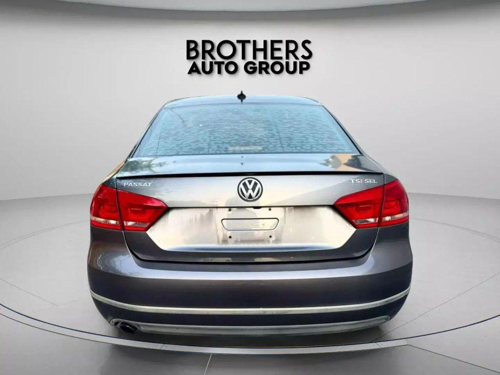 used 2014 Volkswagen Passat car, priced at $8,900