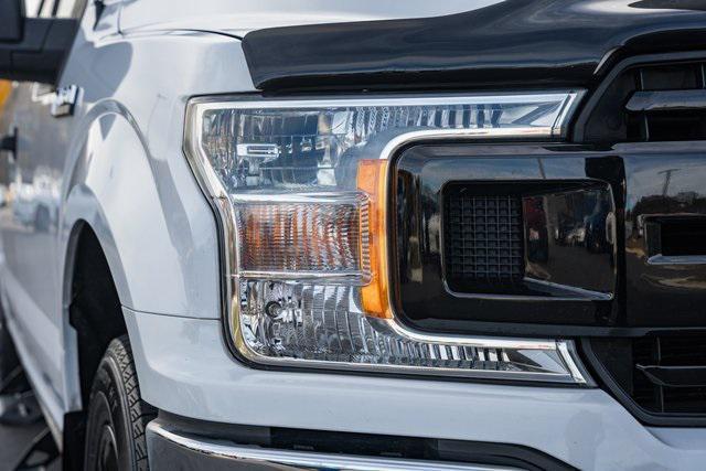 used 2018 Ford F-150 car, priced at $24,046
