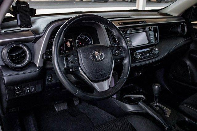 used 2018 Toyota RAV4 car, priced at $17,495