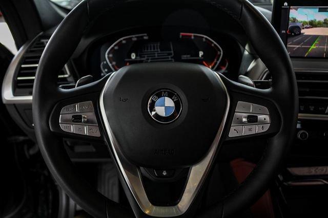 used 2023 BMW X4 car, priced at $44,611