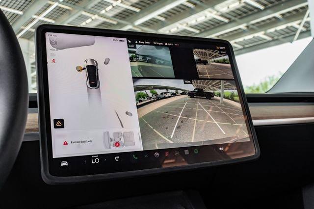 used 2024 Tesla Model Y car, priced at $35,691