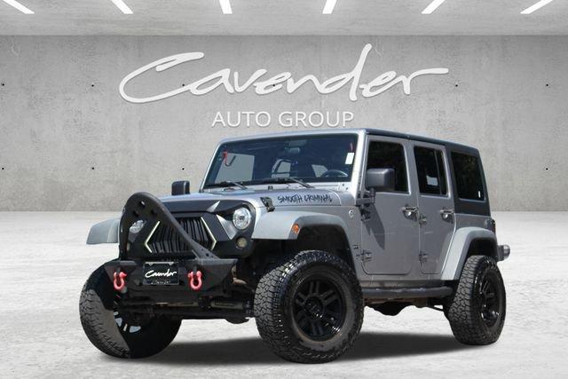 used 2015 Jeep Wrangler Unlimited car, priced at $16,411