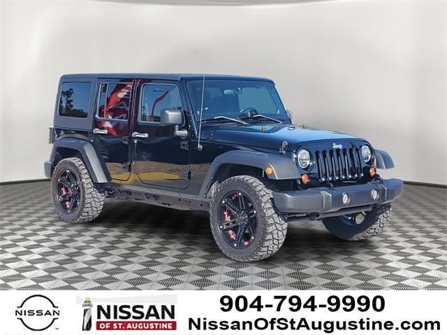 used 2011 Jeep Wrangler Unlimited car, priced at $14,715