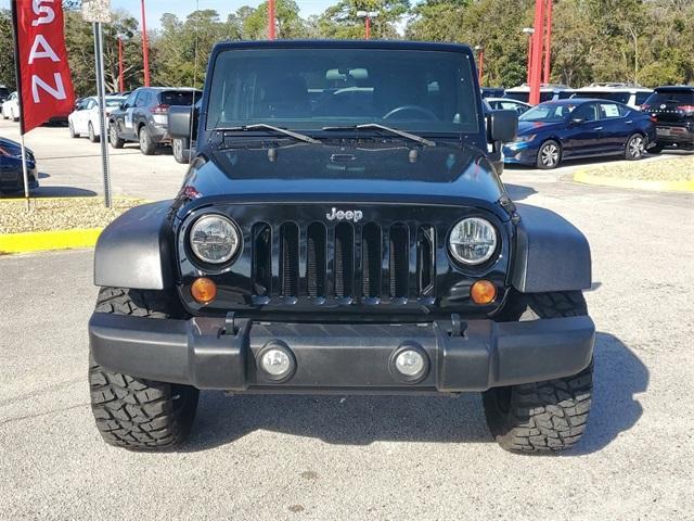 used 2011 Jeep Wrangler Unlimited car, priced at $14,715