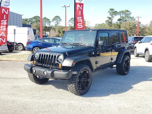 used 2011 Jeep Wrangler Unlimited car, priced at $14,715