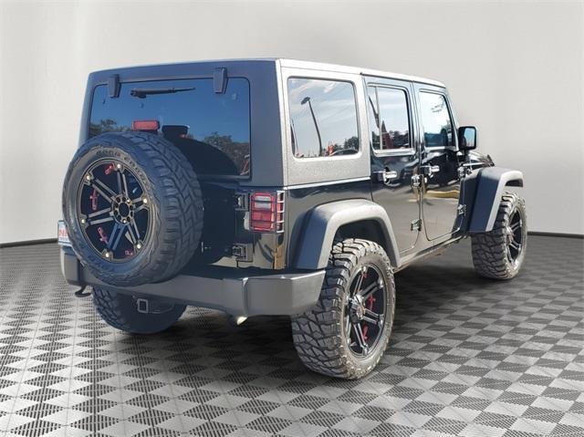 used 2011 Jeep Wrangler Unlimited car, priced at $14,715