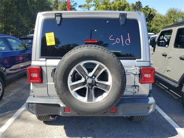 used 2021 Jeep Wrangler Unlimited car, priced at $33,688