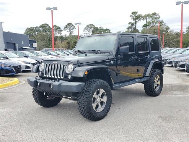 used 2017 Jeep Wrangler Unlimited car, priced at $17,434