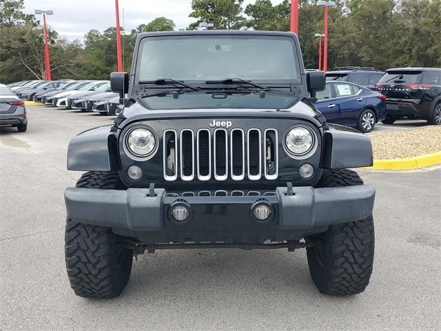 used 2017 Jeep Wrangler Unlimited car, priced at $17,434